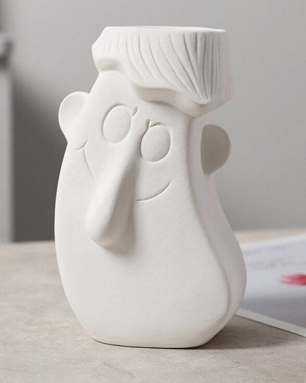 Wazon ceramiczny z motywem twarzy biały