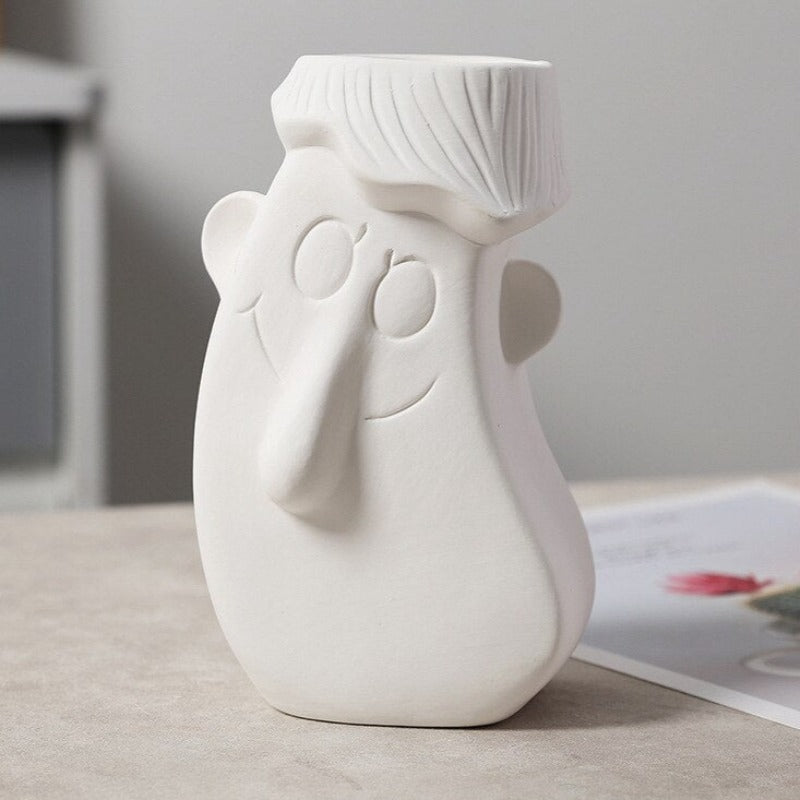 Wazon ceramiczny z motywem twarzy biały