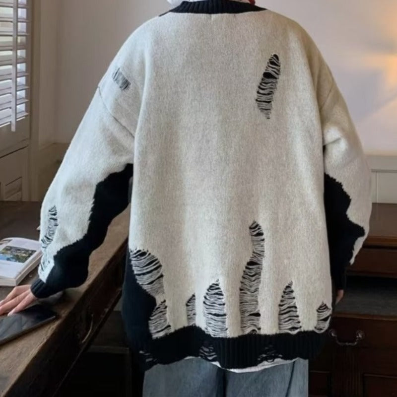 Męski sweter z dekoltem w serek o kroju oversize z przetarciami