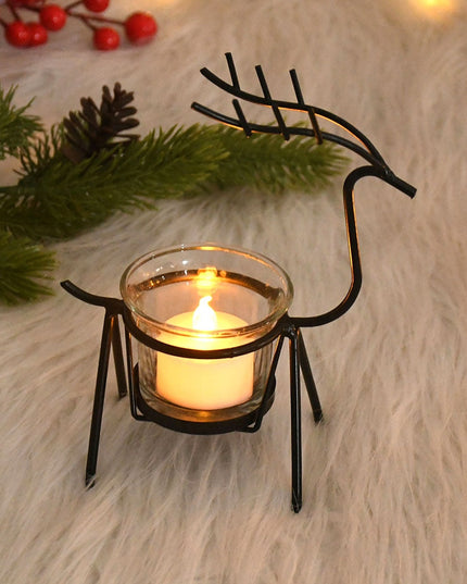 Metalowy czarny świecznik w kształcie renifera