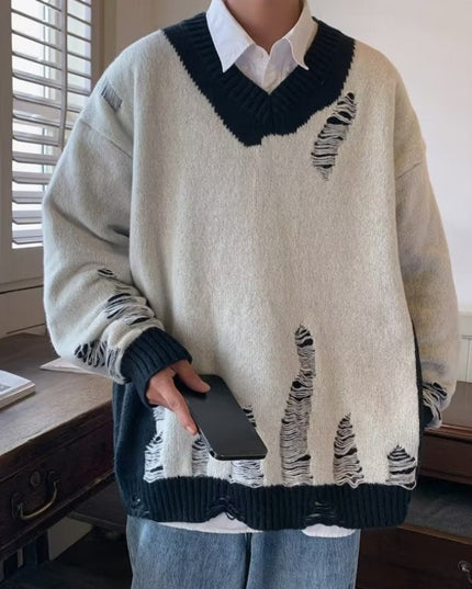 Męski sweter z dekoltem w serek o kroju oversize z przetarciami