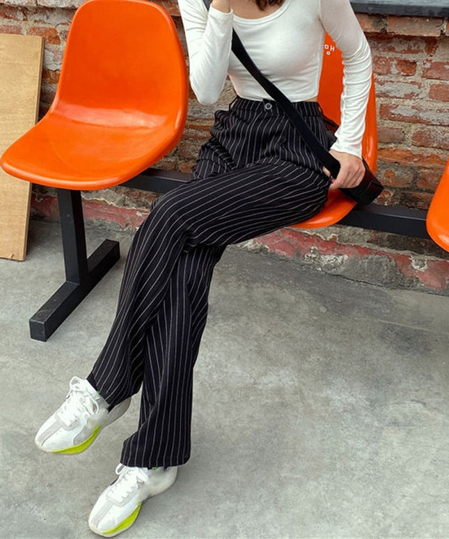 Damskie spodnie chinosy z wysokim stanem i szerokimi nogawkami