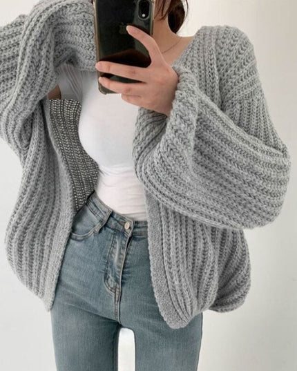 Damski sweter typu kardigan dziergany o kroju oversize