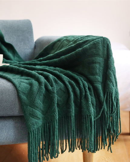 Koc z frędzlami i wzorzystą fakturą