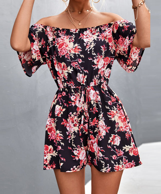 Damski kombinezon w kwiaty z odkrytymi ramionami
