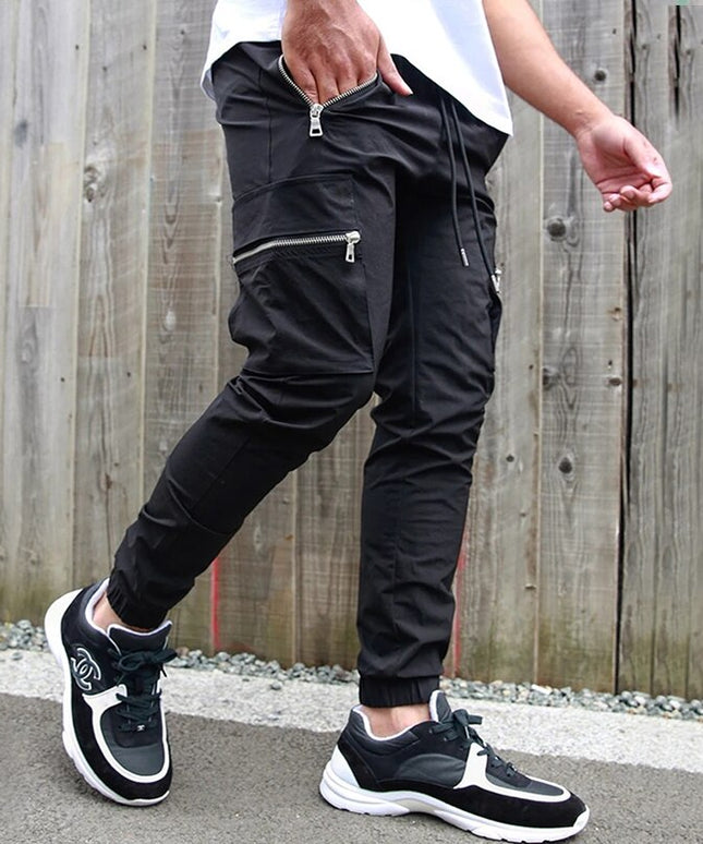 Męskie spodnie bojówki z kieszeniami na suwak