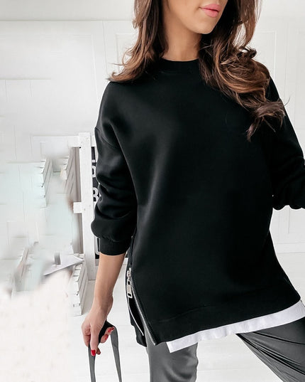 Damska bluza z zamkami po bokach