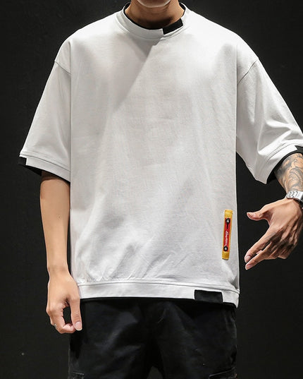 Męski T-shirt oversize z ozdobnymi wstawkami