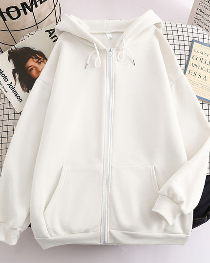 Damska bluza oversize z kapturem zapinana na suwak