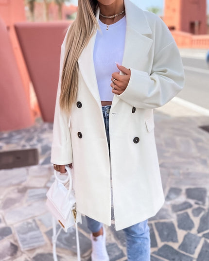 Damski płaszcz dwurzędowy długi z klapami