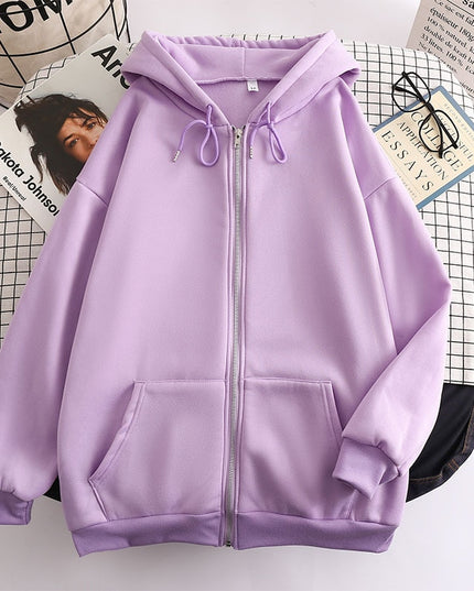 Damska bluza oversize z kapturem zapinana na suwak