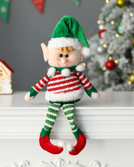 Świąteczny Bożonarodzeniowy uśmiechnięty skrzat z czapeczką w kolorze zielonym