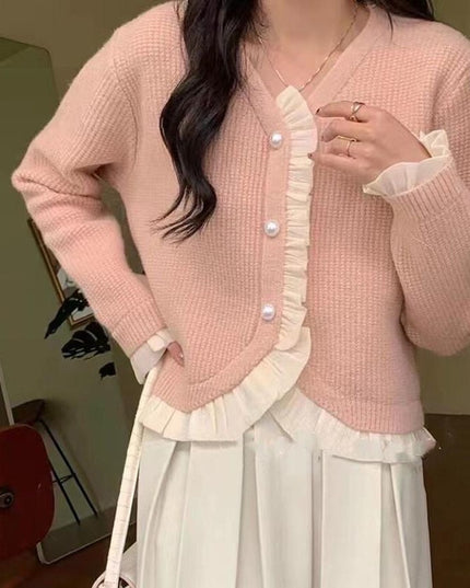 Damski sweter typu kardigan z falbanką