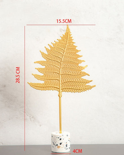 Figurka dekoracyjna liść w złotym kolorze