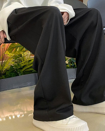 Męskie eleganckie spodnie z szerokimi nogawkami