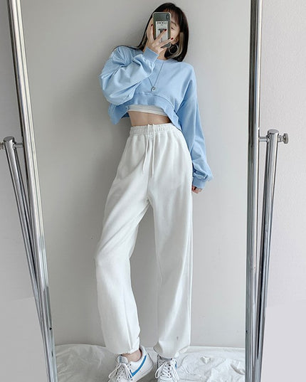 Damskie spodnie dresowe z serduszkiem na kieszonce