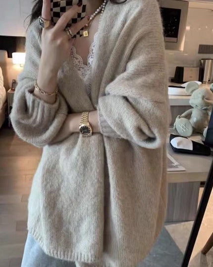 Damski sweter typu kardigan o kroju oversize