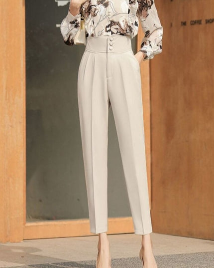 Damskie spodnie chinosy podkreślające talię zapinane na guziki