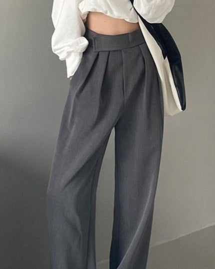 Damskie spodnie materiałowe taliowane z szerokimi nogawkami