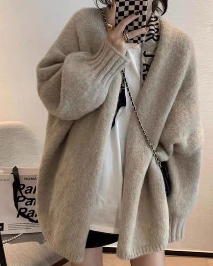 Damski sweter typu kardigan o kroju oversize