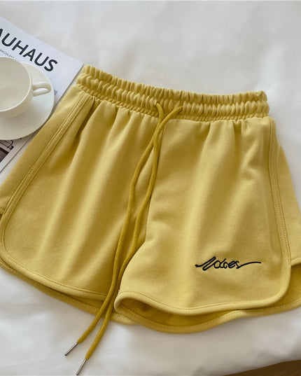 Damskie szorty sportowe z wyszywanym napisem