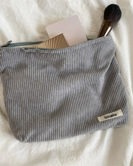 Kosmetyczka sztruksowa w jasnych kolorach