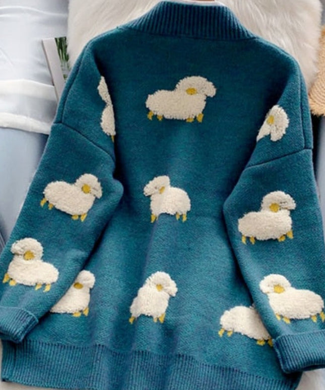 Damski sweter typu kardigan w baranki