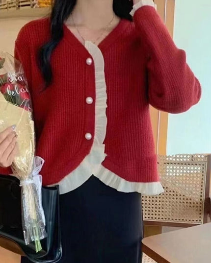 Damski sweter typu kardigan z falbanką