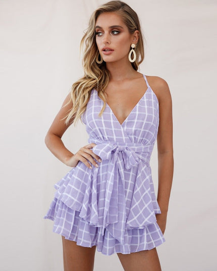 Damski kombinezon w kratkę z wiązaniem w talii