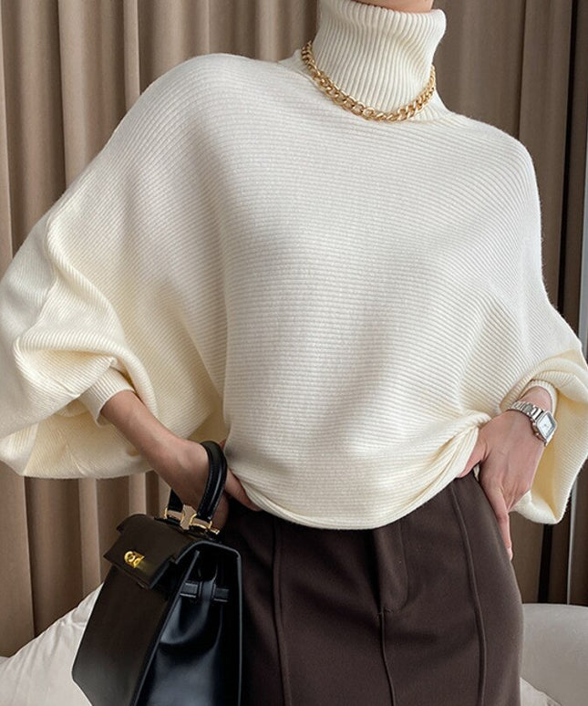 Damski sweter typu golf z bufiastymi rękawami