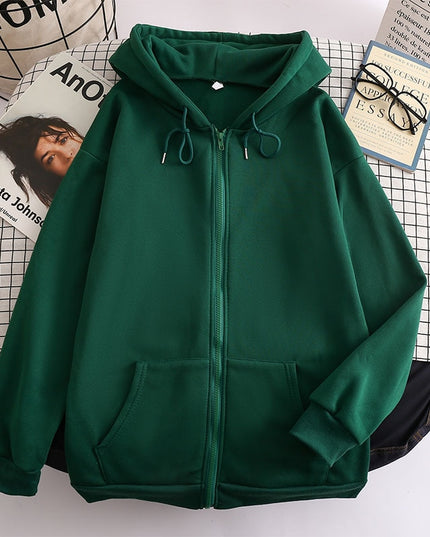 Damska bluza oversize z kapturem zapinana na suwak