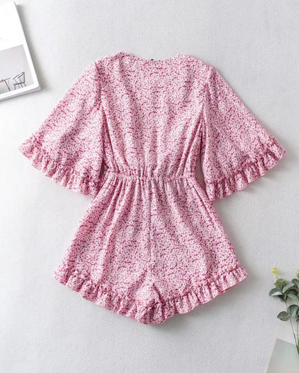 Damski kombinezon w stokrotki z szerokimi rękawami