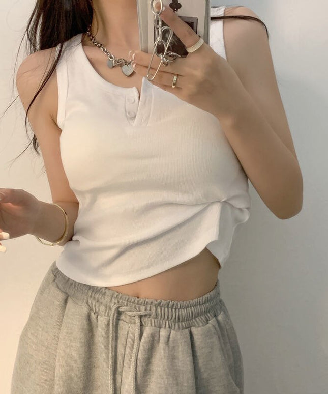 Damski top klasyczny z guzikami na dekolcie