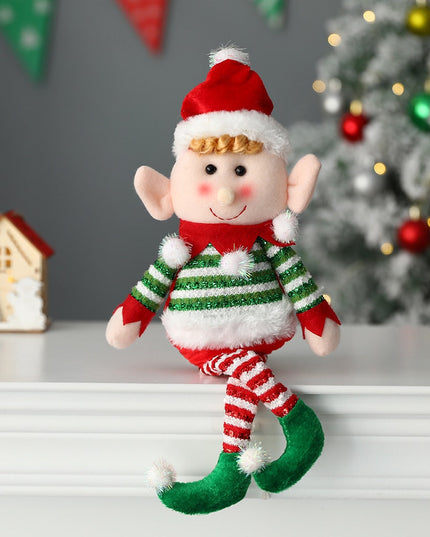 Świąteczny Bożonarodzeniowy uśmiechnięty skrzat z czapeczką w kolorze czerwonym