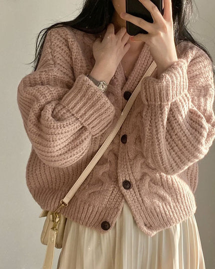 Damski sweter dziergany typu kardigan zapinany na guziki