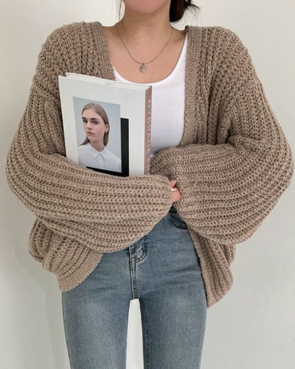 Damski sweter typu kardigan dziergany o kroju oversize