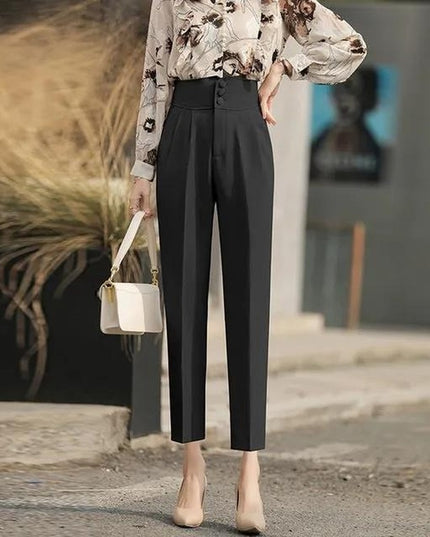 Damskie spodnie chinosy podkreślające talię zapinane na guziki