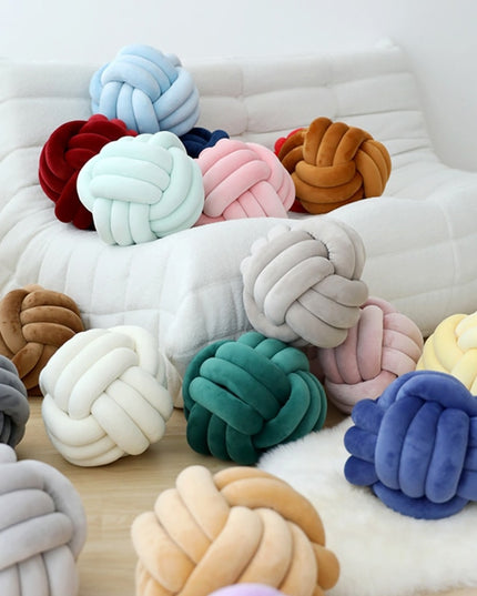 Poduszka dekoracyjna węzeł w pastelowych kolorach