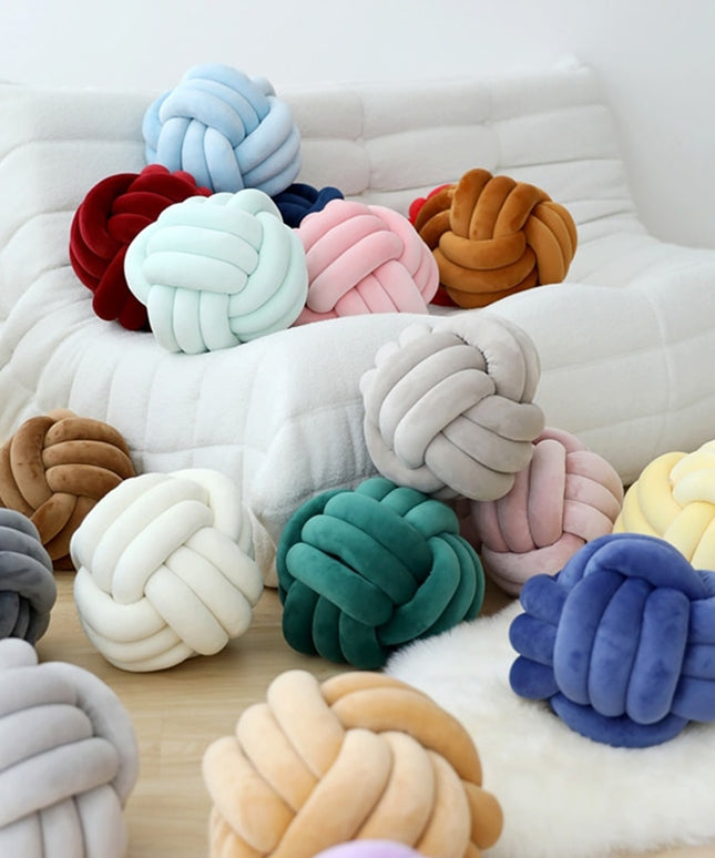 Poduszka dekoracyjna węzeł w pastelowych kolorach