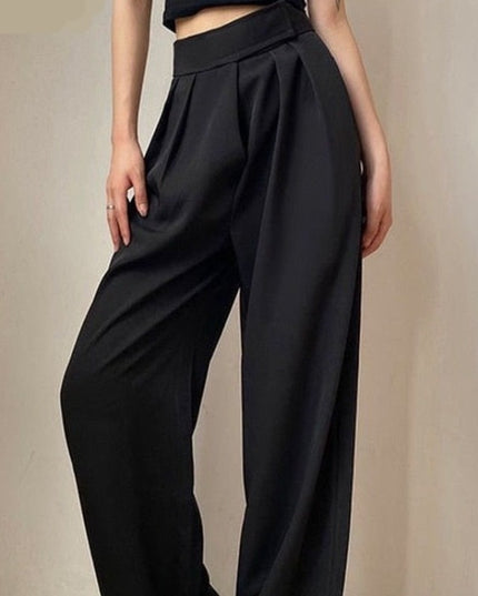 Damskie spodnie materiałowe taliowane z szerokimi nogawkami