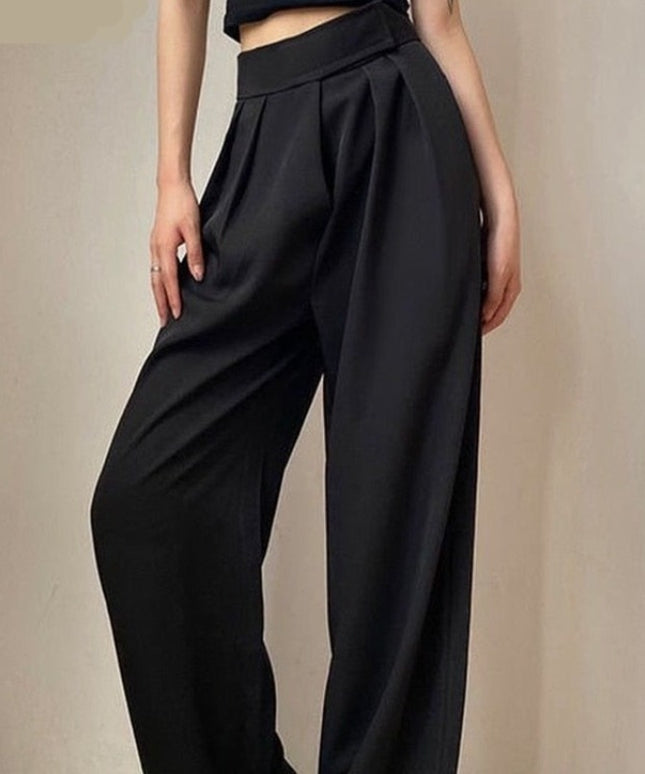 Damskie spodnie materiałowe taliowane z szerokimi nogawkami