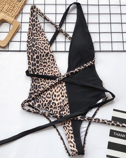 Damski jednoczęściowy strój kąpielowy w panterkę z głębokim dekoltem i wiązaniem