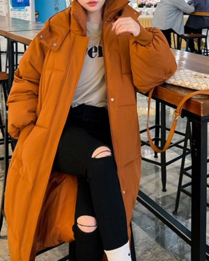 Damska kurtka zimowa z kapturem długości za kolano