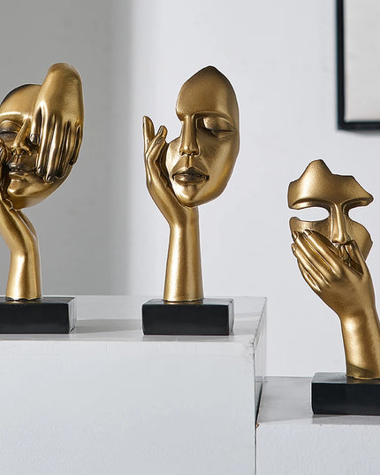 Figurka dekoracyjna twarz w złotych kolorach