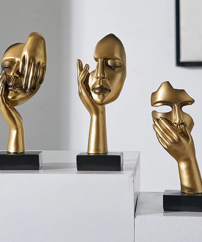 Figurka dekoracyjna twarz w złotych kolorach