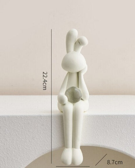 Figurka dekoracyjna królik siedzący w jasnych kolorach