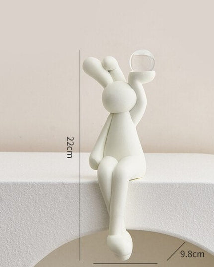 Figurka dekoracyjna królik siedzący w jasnych kolorach