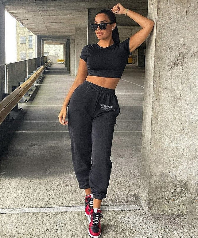 Damskie spodnie dresowe z napisem