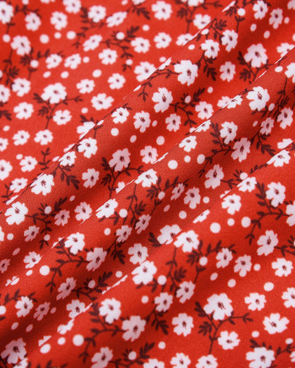 Sukienka czerwona mini w kwiatki zapinana na guziki