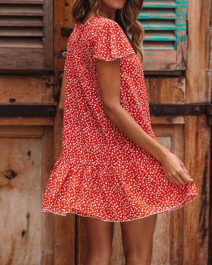 Sukienka czerwona mini w kwiatki zapinana na guziki